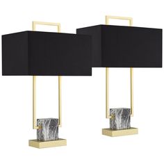 two black and gold lamps with marble blocks on the sides, one is turned off