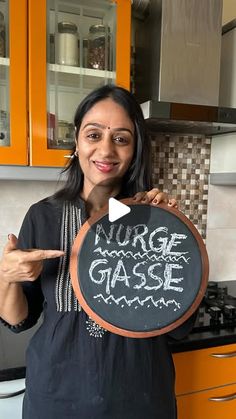 a woman holding up a sign that says nurse glasse