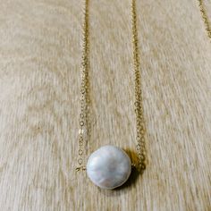 Dainty chain with freshwater pearl coin. Available in 14k gold fill or sterling silver. 16” or 18" length. 14k Gold Necklace With Pearl Charm, Everyday Pearl Necklace With Round Pearl Pendant, Everyday Pearl Necklace With Pearl Pendant, 14k Gold-filled Round Pearl Pendant Jewelry, Pearl Charm Coin Necklace Gift, Everyday 14k Gold Filled Necklaces With Pearl Charm, 14k Gold Round Pearl Drop Necklace, Everyday Necklaces With Pearl Charm, Pearl Chain Coin Necklace