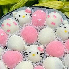 hello kitty candies are arranged in a bowl