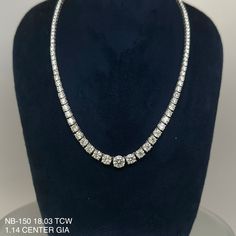 This 18.03 Cts. Natural Round Riviera Necklace boasts a unique combination of elegance and sophistication with its 18K white gold construction and a stunning round-cut center diamond. It is the perfect piece to elevate any look. Get ready to make a statement with this luxurious necklace. CENTER 1.14 RD J VS1 GIA 2457564225SIDE 0.60 RD J VS2 GIA 5453358981 & 0.60 J VS2 RD GIA 5453445943DIAMOND 15.69 RD TCW 112 PCS. H-J VS1-VS218K WG 22.84 GRAMS SIZE 16.50" NB-150 Timeless Silver Round Cut Diamond Necklace, Timeless Silver Diamond Necklace With Round Cut, Silver Round Cut Diamond Necklace Timeless Style, Luxury Diamond Necklace With 17 Jewels, Luxury Formal Jewelry With Lab Grown Diamonds, Luxury Silver Solitaire Necklace With Diamond Cut, Luxury Silver Solitaire Necklace With Brilliant Cut, White Gold Tennis Necklace With Diamond Cut Lab-grown Diamonds, Luxury Platinum Diamond Necklace With 17 Jewels