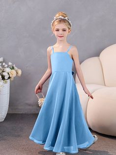 Elevate your bridesmaid game with our Spaghetti Straps Chiffon Junior Bridesmaid Dresses. These sophisticated dresses feature delicate spaghetti straps and a charming bow tie, all made of high-quality chiffon. Perfect for any junior bridesmaid looking to feel elegant and stylish on your special day. Bridesmaid Dresses With Bow, Bridesmaid Games, Dresses With Bow, Champagne Chocolate, Orange Orchid, Junior Bridesmaids, White Wisteria, Lemon Lavender, Sophisticated Dress