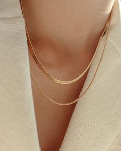 Named after one of my favourite beaches in the world, Seminyak features a classic dainty snake chain that can truly be worn every day and looks stunning with any outfit. She's an essential piece in your jewelry collection that is resistant to tarnish, shower-safe, and sensitive skin-friendly. …………………………………. D E T A I L S • Chain length measures 16 or 18 inches including clasp • Chain width measures 2mm • Tarnish-resistant, waterproof, safe for sensitive skin • Clasp style: lobster clasp • 100% 1 Bone Necklace, Chunky Chain Necklaces, Herringbone Chain, Herringbone Necklace, Seminyak, Beaches In The World, Multi Strand Necklace, Gold Plated Necklace, Gold Filled Jewelry