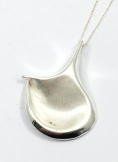 "Vintage Sterling Silver Pendant. The pendant is 52mm high and 42mm wide and hallmarked with silver mark 925 as well Swedish control marks three crowns / S The complimentary chain is 45cm long. It is definitely a design from Matti Hyvärinen, called \"Flame Pendant\", probably made for the export without the company hallmark. Please feel free to contact us for any further information. Free shipment worldwide. Upgrades are available on check out. The pendant will be safely packed and shipped within one to three business days. Thank you for visiting NordicLightsJewels and we hope to welcome you soon again!" Snow Necklace, Vintage Gold Earrings, Vintage Gold Rings, Vintage Silver Rings, Vintage Sterling Silver Rings, Silver Pendant Necklace, Sterling Silver Pendant, Vintage Sterling Silver, Sterling Silver Necklaces