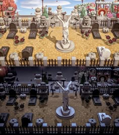 an animated image of a cemetery with statues and flowers