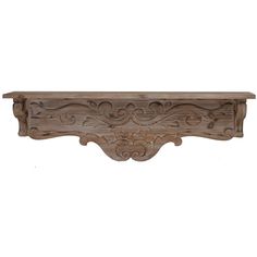 an old wooden shelf with carvings on the top and bottom, isolated against a white background