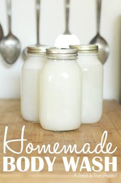 homemade body wash in mason jars with spoons and utensils on the side