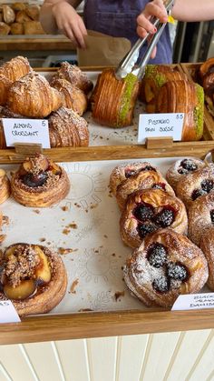 pastries are on display at a bakery