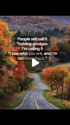 a road with trees in the background and a quote on it that says people will call it holding grudges i'm calling it