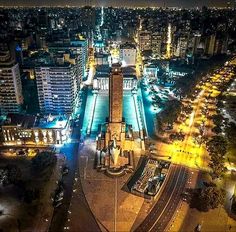 an aerial view of a city at night