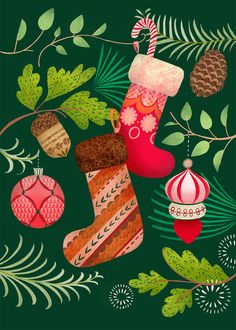 christmas stockings and ornaments on a green background