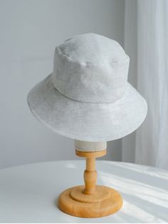 FREE WORLD-WIDE SHIPPING Introducing our elegant pure linen bucket hat in a natural linen color, designed for a timeless and sophisticated look. This hat combines the classic bucket style with the luxurious feel of pure linen, making it the perfect accessory for any casual or semi-formal occasion. Features and Benefits: Material: Pure Linen; Ensures breathability and comfort, ideal for warm weather. Size: M:55-58CM & L:58-60CM Natural Linen Color: Versatile and neutral, complements any outfit ef Wide Brim Bucket Hat, Leather Beret, Knit Beret, Personalized Hats, Hat Beret, Sun Protection Hat, Linen Color, News Boy Hat, Summer Hat