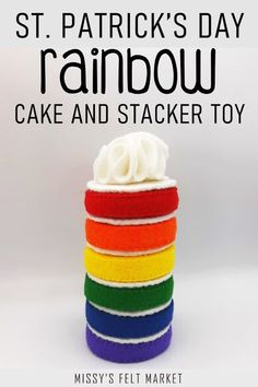 a stack of rainbow cake and stacker toys with the words st patrick's day rainbow