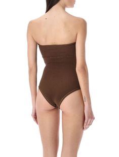 Indulge in luxury with this exquisite swimsuit by Reina Olga. The La Sciura swimsuit is the epitome of sophistication, featuring a strapless one-piece design and elegant underwire detail for a flattering fit. Made from super soft crinkle fabric and adorned with the brand's signature gold zigzag stitching, this swimsuit is a must-have for those who appreciate the finer things in life. Elevate your swimwear collection with the La Sciura swimsuit, perfect for the fashion-forward individual who valu Crinkle Fabric, Swimwear Brands, Swimwear Collection, Luxury Retail, Body Positivity, At The Beach, One Piece Swimsuit, Bathing Suits, Quality Fabric