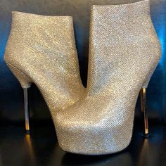 Wonderful Gold Shimmer Bootie With Square Gold Heel Is 3.5 Inch But Overall Height Is Approx 6 In Heel. Never Worn. Fabulous Party Shoe. Size 7. See Pics For Details. This Shoe Is Sparkly Gold With Stunning Fabric Texture. Has Zippers On Inner Side . Winter Party Platform Booties, Party Platform Booties With Round Toe, Party Platform High Heel Booties, High Heel Platform Booties For Party, Party High Heel Platform Booties, Party Platform Ankle Boot Heels, Platform Ankle Boot Heels For Party, Platform Booties For Fall Party, Glamorous Winter Platform Heels