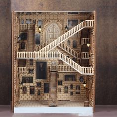 a paper model of a house with stairs