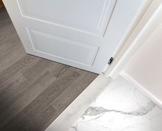 Natural marble threshold that is the perfect fit for showers, bathrooms and doorways. A dynamic and universal solution, designed to perfectly complete any space. Crisp double beveling provides a clean elegant addition to your threshold. This item must be sealed prior to grouting and after grouting, using a premium penetrating sealer. Satori Calacatta Capri 4-in x 36-in Polished Marble Threshold Tile (1-sq. ft/ Piece) in Light | 1001-0377-0 Beverly House, Marble Threshold, Shower Threshold, Black Marble Bathroom, Indoor Flooring, Entryway Tile, White Tile Floor, Accent Trim, Flooring Projects