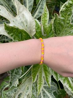 Our beaded bracelets are handmade with care. This sunrise bracelet has an elastic thread meaning it can fit most wrists (15cm-22cm) It is produced with pink, orange, yellow and silver beads and has a lobster claw to ensure it fits to perfection. Our bracelets are packaged carefully with a hand-written thank you note. If you have any questions don't be afraid to ask! Also available in a necklace-find this on our page! Instagram- @beachyxbeautiful Yellow Beaded Bracelets With Round Beads For Everyday, Adjustable Yellow Beaded Bracelets With Tiny Beads, Trendy Yellow Beaded Bracelets With Tiny Beads, Adjustable Peach Beaded Bracelets As Gift, Adjustable Peach Beaded Bracelet As Gift, Adjustable Yellow Beaded Bracelets, Trendy Yellow Beaded Bracelets, Adjustable Orange Beaded Bracelets With 8mm Beads, Yellow Round Bead Bracelets For Everyday