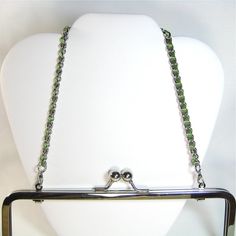 "Like jewelry for your bag! Made of iron with a 2-coat nickel-free plating process, this chain is just the right length to go with your clutch bag. So nice you could double it up and wear it like a necklace! This listing is for the \"nickel-free purse chain(TM)\" in Sterling and a 24\" length of ribbon in SAGE GREEN for you to thread. Length of chain: 13 inches (33cm) tip-to-tip Know your metals! The following are FACTS as related to my \"nickel-free purse chain(TM)\": My chains are plated nicke Rainbow Metal, Silver Clutch, Nickel Plating, Metallic Purse, Espresso Brown, Robins Egg Blue, Poly Bags, So Nice, Classic Blue