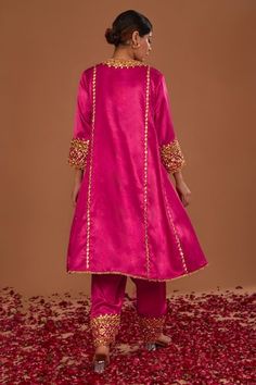 Royal cerise silk anarkali with gota, sequins and pearls hand embroidery. Comes with salwar and an organza dupatta. - Aza Fashions Anarkali Tissue Silk Kurta With Mirror Work, Navratri Tissue Silk Anarkali Set With Dabka Work, Party Anarkali Set With Gota Work In Raw Silk, Festive Tissue Silk Anarkali Set With Dori Work, Silk Choli For Eid, Festive Eid Choli With Dabka Work, Tissue Silk Kurta With Mirror Work For Diwali, Raw Silk Choli With Gota Work For Eid, Party Salwar Kameez With Gota Work For Navratri