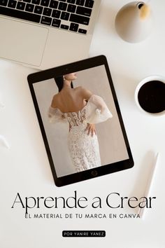 the cover of an ipad with a woman's dress on it, next to a cup of coffee