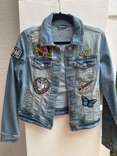 Ladies xs soft denim jacket designed by rockthejacket. One of kind. More pics on instagram. Patches sewn on. Trendy Patched Denim Jacket, Trendy Cotton Denim Jacket With Patches, Trendy Denim Jacket With Embroidered Patch For Spring, Trendy Cotton Denim Jacket With Embroidered Patch, Trendy Medium Wash Outerwear With Patches, Trendy Denim Outerwear With Embroidered Patch, Trendy Denim Jacket With Patches, Casual Medium Wash Denim Jacket With Embroidered Patch, Trendy Denim Jacket With Embroidered Patch