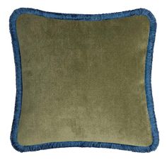 a green and blue pillow with fringe trim