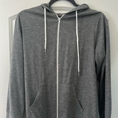 Never Worn Soft Hoodie Gray Hooded Casual Jacket, Casual Gray Hooded Jacket With Long Sleeves, Casual Everyday Hooded Jacket With Long Sleeves, Casual Everyday Hooded Jacket, Casual Long Sleeve Hooded Jacket For Everyday, Casual Gray Long Sleeve Hooded Jacket, Gray Casual Hooded Jacket With Ribbed Cuffs, Casual Hooded Jacket For Spring, Casual Spring Hooded Jacket For Everyday