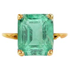 This contemporary ring features a natural mint emerald set in 14 karat yellow gold. It belongs to our Mesopotamian collection and is currently a size 15 (equivalent to US size 4). Octagon-shaped emerald from Colombia weighs 4.71 carats and measures 12.7x9.7mm. If you prefer a different size or gemstone, we can customize this ring in 14 or 18 karat gold with options including garnet, red or green tourmaline, tender rose morganite, emeralds or sapphires, or storm purple spinels. We also offer the option to add a crocodile on top of the gem or adjust the size of the ring to fit your preferences. However, please note that while the crocodile design adds a unique beauty to the ring, it may not be entirely comfortable to wear. Therefore, we recommend the crocodile design only for pendant necklac Storm Purple, Crocodile Design, Green Costumes, Emerald Set, Costume Rings, Garnet Red, Luxe Jewelry, Contemporary Ring, Unique Beauty