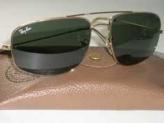 You are bidding on very gently/slightly/barely used, stunning looking pair of 1980's 58[]17mm VINTAGE B&L RAY BAN W0502 GEP ARISTA G15 UV SLEEK EXPLORER AVIATOR SUNGLASSES w/CASE. Please see pictures for further details & markings. Both lenses as well as nose pads are etched with small BL logo. LOOKS PRACTICALLY BRAND NEW...MINT G15 UV GLASS LENSES.  Distance b/w the hinges is 5 1/4", overall vertical height is 1 3/4" & length of temple arm is 5". Consolidated shipping is offered on multiple ite Ray Ban Frames, Sunglasses Mens, Gold Aviator Sunglasses, Fashion Eye Glasses, Aviator Sunglasses Mens, Eye Glasses, Aviator Sunglasses, Fashion Sunglasses, Hinges