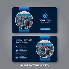 two blue business cards with cityscape in the background