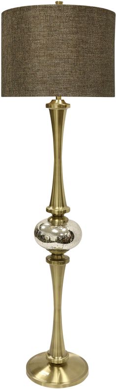 a table lamp with a brown shade on it and a gold base, in front of a white background