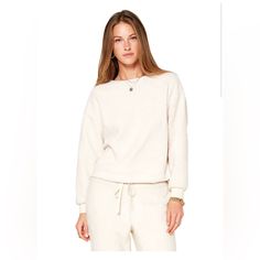 Self: 100% Poly; Lining: 100% Cotton Machine Wash Cold Sherpa Material Pullover Styling Boat Neck Banded Ribbed Cuffs Winter White Long Sleeve Loungewear Top, Winter White Long Sleeve Lounge Top, Winter White Relaxed Fit Tops For Loungewear, Relaxed Fit Winter White Tops For Loungewear, Cream Cozy Fit Long Sleeve Sweatshirt, Winter White Sweater With Ribbed Cuffs For Loungewear, Cozy Winter White Tops With Ribbed Cuffs, Cozy Winter White Tops For Loungewear, Cream Long Sleeve Sweatshirt For Loungewear