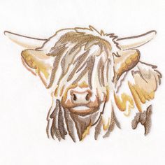 an embroidered image of a bull's head with long hair