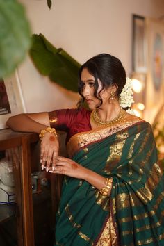 Jasmine flower hairstyle, vintage saree, saree look, bangles, henna , gold Indian jewelry, desi fashion, tamil style, green saree, red saree blouse, braided hairstyle Tamil Bridesmaid Hairstyle, Jasmine Flower Hairstyle For Saree, Tamil Saree Style, Jasmine Flower Hairstyle, Tamil Outfits, Red And Green Saree, Green And Red Saree, Desi Hair, Tamil Saree