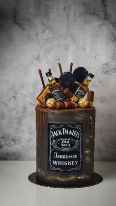 an old fashioned whiskey can with chocolates and candies in it