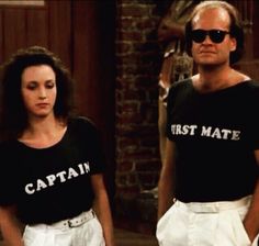 two people standing next to each other wearing t - shirts that read first mate and first mate