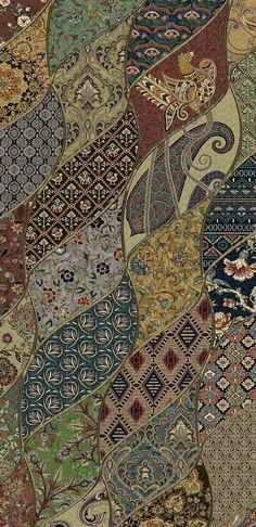 an assortment of different colored rugs on display