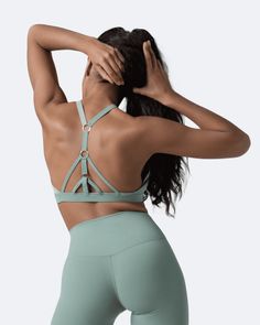 The perfect blend of fashion and functionality that will catch everyone’s eye. This top goes with everything, but match it with our body-shaping leggings and it's game over! Fitted Yoga Top With Built-in Padding, High Stretch Tops With Built-in Padding For Pilates, Compression Tops With Built-in Padding For Training, High Stretch Tops With Built-in Padding For Gym, Versatile Sculpting Activewear For Workout, High Stretch Sportswear Tops With Built-in Padding, Compression Tops With Built-in Padding For Pilates, Versatile Sculpting Activewear For Gym, Fitted Athleisure Tops With Built-in Padding