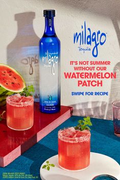 an advertisement for margaritas with watermelon and grapefruit on the table