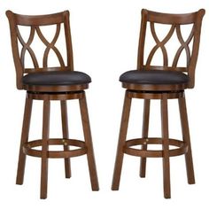 two wooden barstools with black leather seats