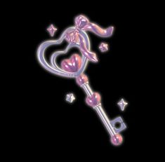 a pink key with hearts and stars on it