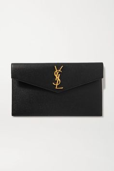 SAINT LAURENT's 'Uptown' pouch fits everything you need for an evening at a gallery opening or rooftop bar. It's been made in Italy from textured-leather and decorated with the iconic 'YSL' hardware in gold. Carry it in hand or slip it inside one of the brand's bags. -- Black textured-leather (Calf) - Magnetic-fastening front flap - Made in Italy Saint Laurent Jeans, Black Leather Clutch, Saint Laurent Bags, Popular Bags, Accessory Pouch, Saint Laurent Bag, Branded Bags, Leather Pouch, Leather Clutch