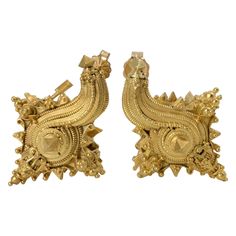 A fine and remarkable pair of Javanese high karat gold (22k+) earrings in the form of a conch shell, 12th to 15th century, Java, Indonesia. The Indonesian gold earrings cast in 22k gold and worked with fine filigree and granulation to the surface. The earrings retain their original hinges, and were either meant to be worn as ear ornaments, or possibly cord fasteners. A modern 18k gold post back makes them functional as earrings for today's wearer. The form of the earrings bear special significan Traditional Yellow Gold Earrings With Historical Design, Antique 22k Yellow Gold Earrings, Traditional Earrings With Historical Design For Wedding, Traditional Historical Design Earrings For Wedding, Ornate Gold Earrings With Historical Design, Traditional Wedding Earrings With Historical Design, Ceremonial Yellow Gold Earrings, Traditional Gold Baroque Earrings, Ornate 22k Gold Earrings