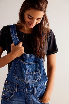 A shortened version of our favorite Ziggy Overalls! **Fit:** Relaxed, bib-and-brace silhouette **Features:** Front bib pocket, rolled hemlines, adjustable straps, side button closures, five-pocket design, frayed cuffs **Why We | We The Free Ziggy Shortalls at Free People in Medium Wash, Size: XL Ziggy Shortalls, Ziggy Overalls, Overalls Fit, Smaller Hips, Dungarees, Pocket Design, Boho Outfits, Mantra, Dream Closet