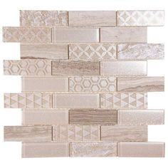 the back side of a white and beige mosaic tile wall