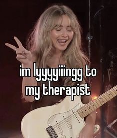 a woman holding a white guitar with the words i'm lyggling to my therapist