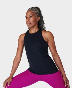 A new, lighter version of our bestselling Athlete Seamless Gym Vest. Ultra-lightweight fabric is sweat-wicking with 4-way stretch. Looser, more relaxed fit feels lighter on the body than our classic Athlete. Mesh in high-sweat areas for breathability. Front length: 62cm / 24.5”. Model wears size L/XL and is 178cm/5'10" tall. Style Code: SB9451Colour: Black Sporty 4-way Stretch Activewear With Mesh Back, Sports Racerback Top With 4-way Stretch, Racerback Sports Tops With 4-way Stretch, 4-way Stretch Sleeveless Activewear For Light Exercise, Go-dry 4-way Stretch Racerback Top, 4-way Stretch Sleeveless Activewear For Workout, Racerback Top With 4-way Stretch And Go-dry Technology, Functional 4-way Stretch Tank Top For Yoga, Sleeveless Tops With 4-way Stretch For Pilates