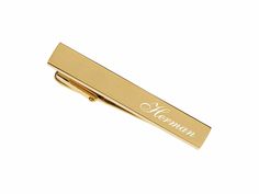 "This custom engraved high quality gold tie clip is a great accent to keep your suit & tie looking sharp. The clip can be engraved with a name, initials or date. A personalized tie clip really adds a sense of sophistication and style to your formal wear. THERE ARE 3 WAYS TO PERSONALIZE YOUR TIE PIN Please make sure you select your initials in the order you would like them to appear as we do not reformat the order once submitted. #1 John (FIRST NAME) Smith (LAST NAME) Michael (MIDDLE NAME) (L Classic Gold Suit And Tie Accessories For Formal Events, Classic Gold Suit And Tie Accessories For Formal Occasions, Elegant Gold Rectangular Suit And Tie Accessories, Gold Suit And Tie Accessories For Father's Day, Classic Gold Suit And Tie Accessories, Formal Engraved Cufflinks, Groomsman Tie Clips, Father's Day Gold Engraved Cufflinks, Gold Tie Clip