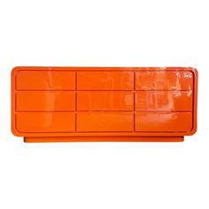 an orange plastic drawer is shown on a white background with the bottom section showing six drawers